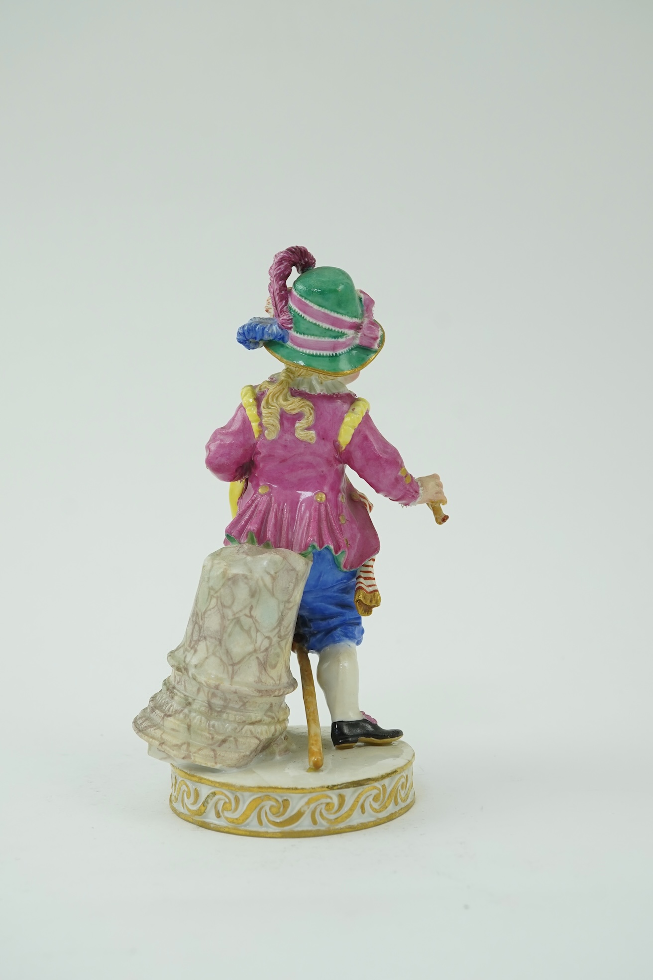 A Meissen figure of a boy on a hobby horse, 19th century